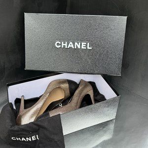 CHANEL metallic gold black toe cap crystal CC logo round toe heel pumps EU42
